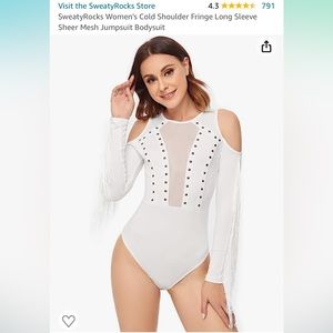 White bodysuit with shoulder cutouts and fringe on the sleeves